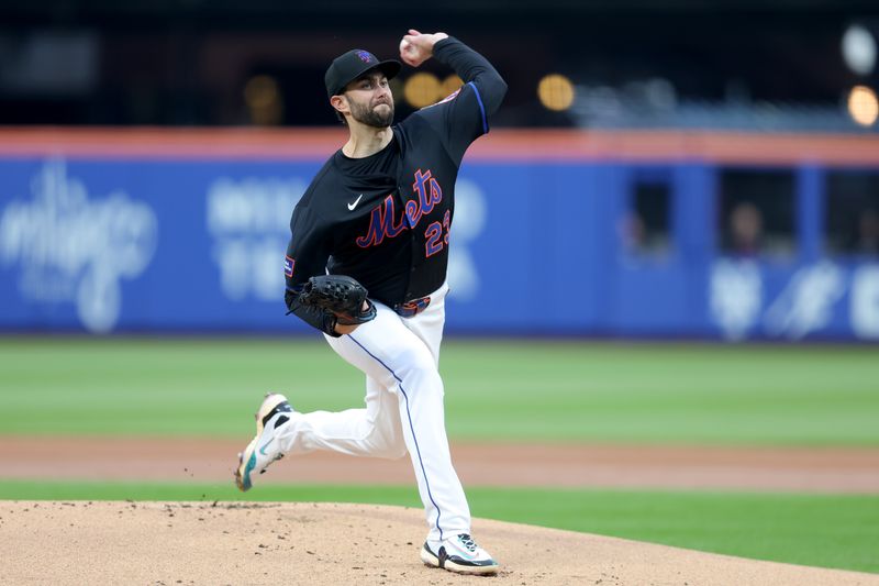 May 30, 2025; New York City, New York, USA; New York Mets starting pitcher David Peterson (23) pitches against the Colorado Rockies during the first inning at Citi Field. Mandatory Credit: Brad Penner-Imagn Images