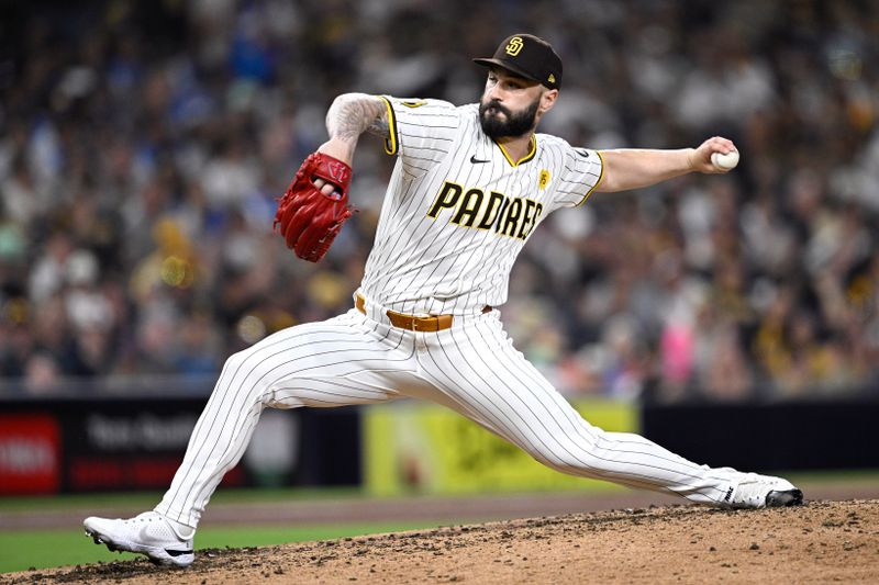 Aug 13, 2024; San Diego, California, USA; San Diego Padres relief pitcher Tanner Scott (66) pitches against the Pittsburgh Pirates during the eighth inning at Petco Park. Mandatory Credit: Orlando Ramirez-USA TODAY Sports