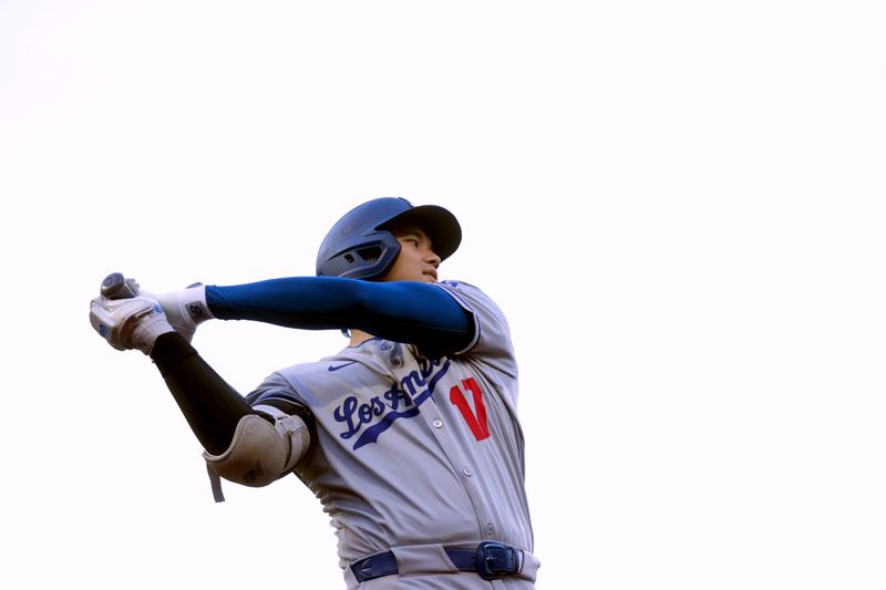 Sep 13, 2025; San Francisco, California, USA; Los Angeles Dodgers designated hitter Shohei Ohtani (17) warms up in the on deck circle before the start of the game against the San Francisco Giants at Oracle Park. Mandatory Credit: Cary Edmondson-Imagn Images