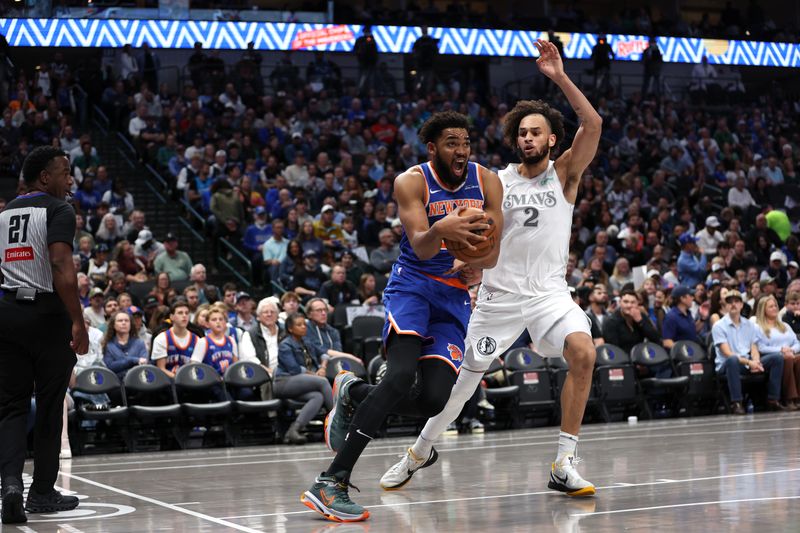 DALLAS, TX - NOVEMBER 27: Karl-Anthony Towns #32 of the New York Knicks drives to the basket during the game against the Dallas Mavericks  during a regular season game on November 27, 2024 at dalAmerican Airlines Center in Dallas, Texas. NOTE TO USER: User expressly acknowledges and agrees that, by downloading and or using this photograph, User is consenting to the terms and conditions of the Getty Images License Agreement. Mandatory Copyright Notice: Copyright 2024 NBAE (Photo by Tim Heitman/NBAE via Getty Images)