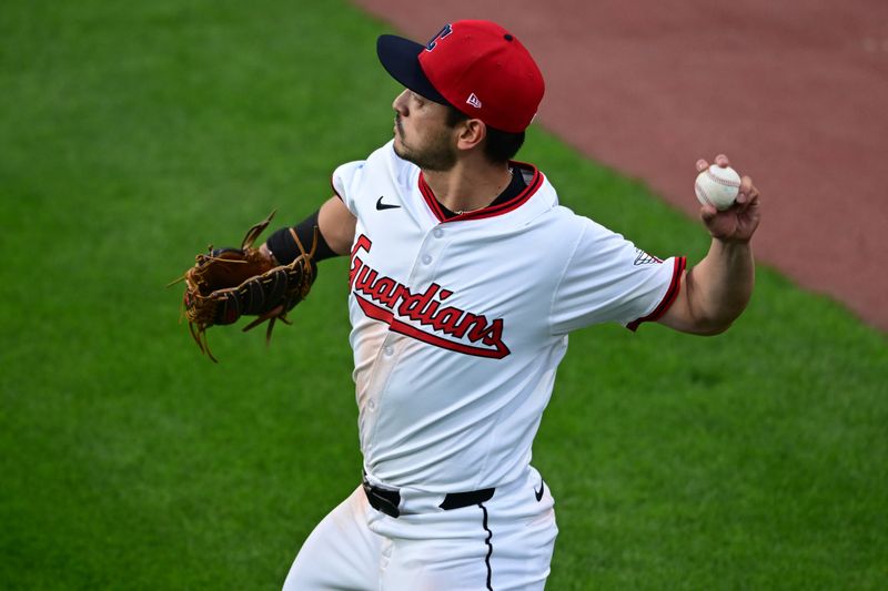 Apr 21, 2025; Cleveland, Ohio, USA; Cleveland Guardians left fielder Steven Kwan (38) throws the ball during the fifth inning against the New York Yankees at Progressive Field. Mandatory Credit: David Dermer-Imagn Images