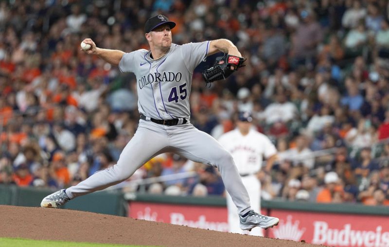 Jul 5, 2023; Houston, Texas, USA; Colorado Rockies starting pitcher Chase Anderson (45) pitches against the Houston Astros in the first inning at Minute Maid Park. Mandatory Credit: Thomas Shea-USA TODAY Sports