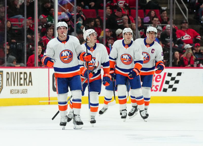 Dec 23, 2023; Raleigh, North Carolina, USA; New York Islanders center Bo Horvat (14) celebrates his goal against the Carolina Hurricanes during the first period at PNC Arena. Mandatory Credit: James Guillory-USA TODAY Sports