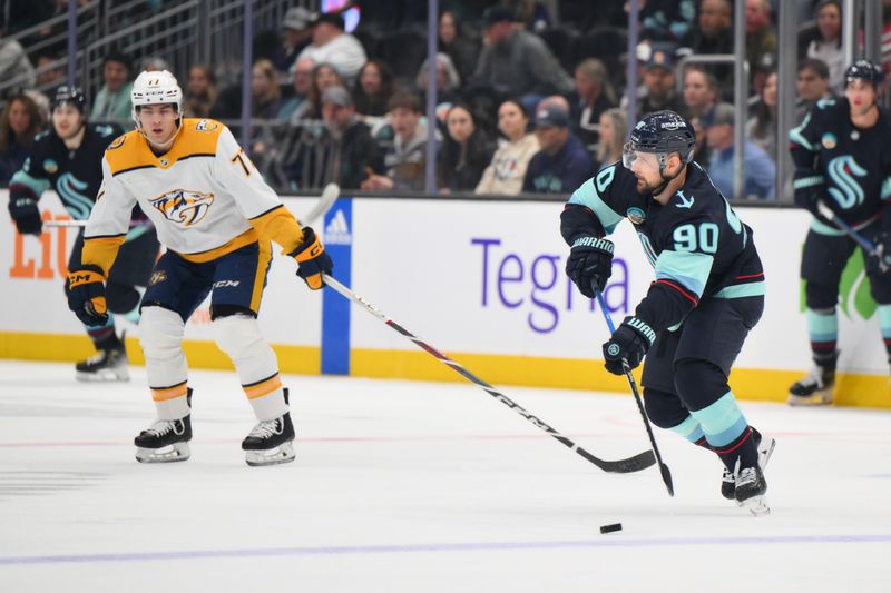 Mar 16, 2024; Seattle, Washington, USA; Nashville Predators center Ryan O'Reilly (90) advances the puck against the Nashville Predators during the first period at Climate Pledge Arena. Mandatory Credit: Steven Bisig-USA TODAY Sports