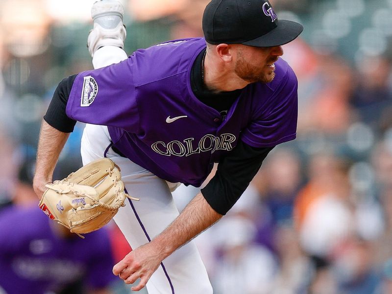 Apr 22, 2024; Denver, Colorado, USA; Colorado Rockies starting pitcher Austin Gomber (26) pitches in the first inning against the San Diego Padres at Coors Field. Mandatory Credit: Isaiah J. Downing-USA TODAY Sports