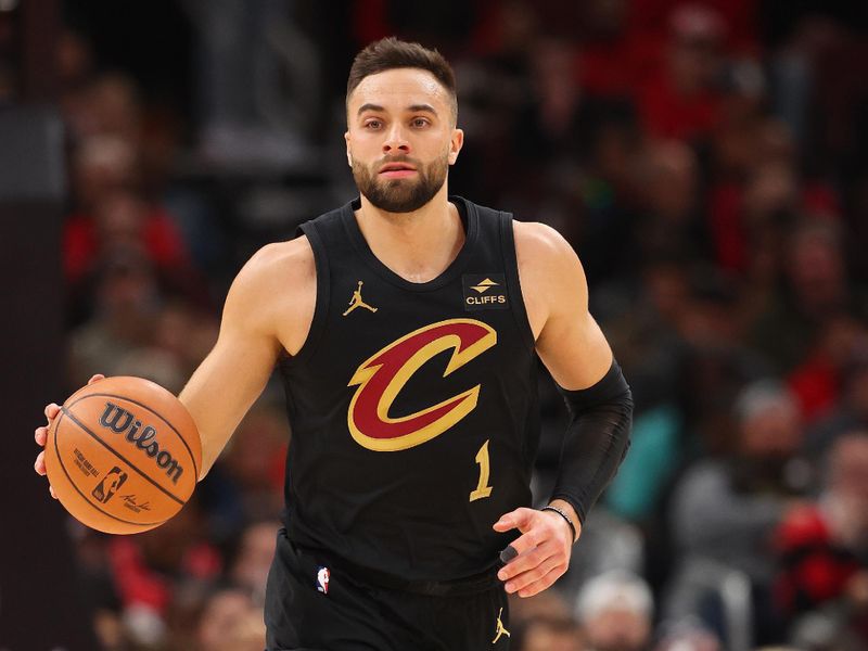 CHICAGO, ILLINOIS - DECEMBER 23: Max Strus #1 of the Cleveland Cavaliers dribbles up the court against the Chicago Bulls during the first half at the United Center on December 23, 2023 in Chicago, Illinois. NOTE TO USER: User expressly acknowledges and agrees that, by downloading and or using this photograph, User is consenting to the terms and conditions of the Getty Images License Agreement.  (Photo by Michael Reaves/Getty Images)