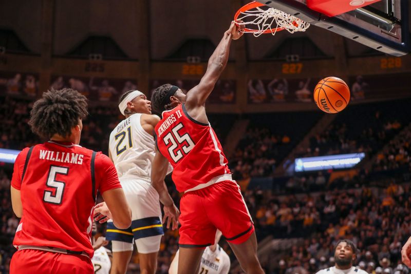 Mar 2, 2024; Morgantown, West Virginia, USA; Texas Tech Red Raiders forward Robert Jennings (25) dunks the ball during the first half against the West Virginia Mountaineers at WVU Coliseum. Mandatory Credit: Ben Queen-USA TODAY Sports