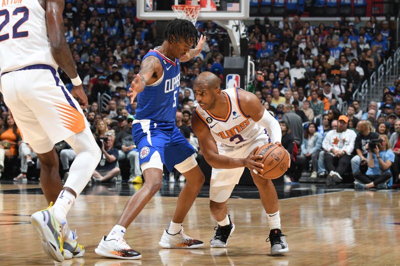 LOS ANGELES, CA - APRIL 20: Chris Paul #3 of the Phoenix Suns dribbles the ball during the game against the LA Clippers during Round 1 Game 3 of the 2023 NBA Playoffs on April 20, 2023 at Crypto.Com Arena in Los Angeles, California. NOTE TO USER: User expressly acknowledges and agrees that, by downloading and/or using this Photograph, user is consenting to the terms and conditions of the Getty Images License Agreement. Mandatory Copyright Notice: Copyright 2023 NBAE (Photo by Andrew D. Bernstein/NBAE via Getty Images)