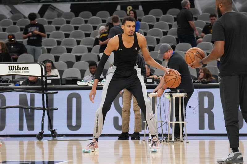 SAN ANTONIO, TX - MARCH 11: Victor Wembanyama #1 of the San Antonio Spurs warms up before the game against the Golden State Warriors on March 11, 2024 at the AT&T Center in San Antonio, Texas. NOTE TO USER: User expressly acknowledges and agrees that, by downloading and or using this photograph, user is consenting to the terms and conditions of the Getty Images License Agreement. Mandatory Copyright Notice: Copyright 2024 NBAE (Photos by Jesse D. Garrabrant/NBAE via Getty Images)