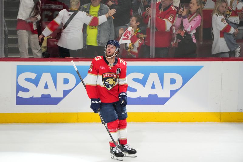 Jun 9, 2025; Sunrise, Florida, USA; Florida Panthers forward Carter Verhaeghe (23) celebrates scoring during the first period Edmonton Oilers in game three of the 2025 Stanley Cup Final at Amerant Bank Arena. Mandatory Credit: Jim Rassol-Imagn Images