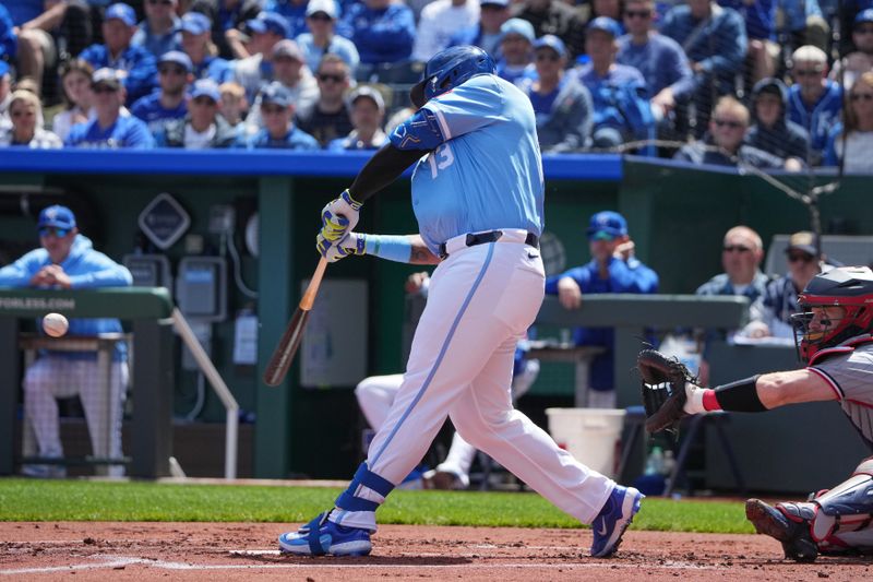 Apr 10, 2025; Kansas City, Missouri, USA; Kansas City Royals designated hitter Salvador Perez (13) hits a one run single against the Minnesota Twins in the first inning at Kauffman Stadium. Mandatory Credit: Denny Medley-Imagn Images