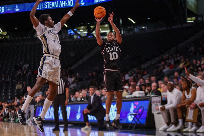 Dec 3, 2025; Atlanta, Georgia, USA; Mississippi State Bulldogs guard Jayden Epps (10) shoots past Georgia Tech Yellow Jackets forward Kowacie Reeves Jr. (14) in the first half at McCamish Pavilion. Mandatory Credit: Brett Davis-Imagn Images
