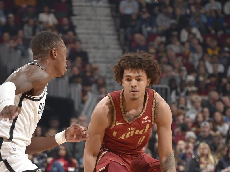 CLEVELAND, OH - MARCH 10: Craig Porter #9 of the Cleveland Cavaliers dribbles the ball during the game against the Brooklyn Nets on March 10, 2024 at Rocket Mortgage FieldHouse in Cleveland, Ohio. NOTE TO USER: User expressly acknowledges and agrees that, by downloading and/or using this Photograph, user is consenting to the terms and conditions of the Getty Images License Agreement. Mandatory Copyright Notice: Copyright 2024 NBAE (Photo by David Liam Kyle/NBAE via Getty Images)