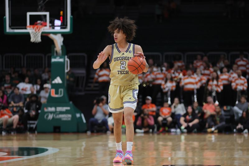 Feb 24, 2024; Coral Gables, Florida, USA; Georgia Tech Yellow Jackets guard Naithan George (2) dribbles the basketball against the Miami Hurricanes during the first half  at Watsco Center. Mandatory Credit: Sam Navarro-USA TODAY Sports