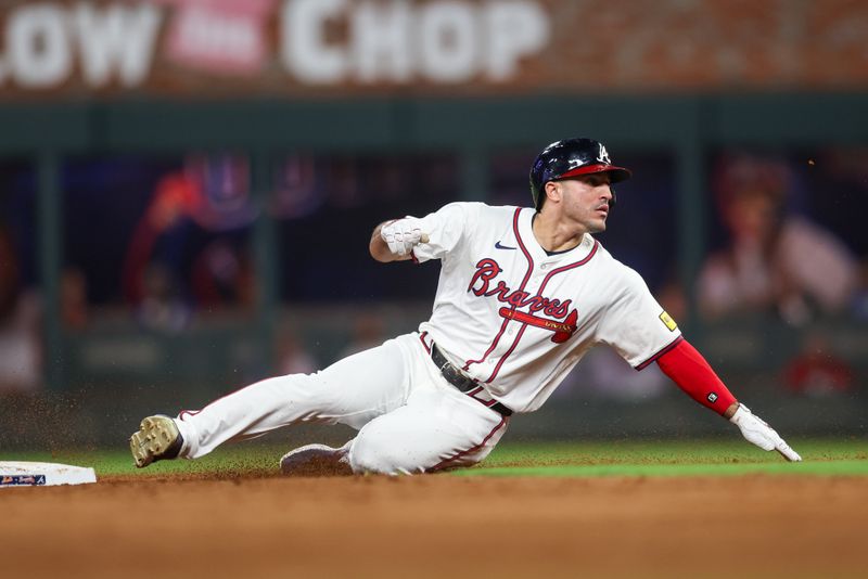 Sep 24, 2024; Atlanta, Georgia, USA; Atlanta Braves left fielder Ramon Laureano (18) steals second base against the New York Mets in the third inning at Truist Park. Mandatory Credit: Brett Davis-Imagn Images
