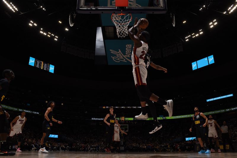 DENVER, CO - FEBRUARY 29: Jimmy Butler #22 of the Miami Heat drives to the basket during the game against the Denver Nuggets on February 29, 2024 at the Ball Arena in Denver, Colorado. NOTE TO USER: User expressly acknowledges and agrees that, by downloading and/or using this Photograph, user is consenting to the terms and conditions of the Getty Images License Agreement. Mandatory Copyright Notice: Copyright 2024 NBAE (Photo by Garrett Ellwood/NBAE via Getty Images)