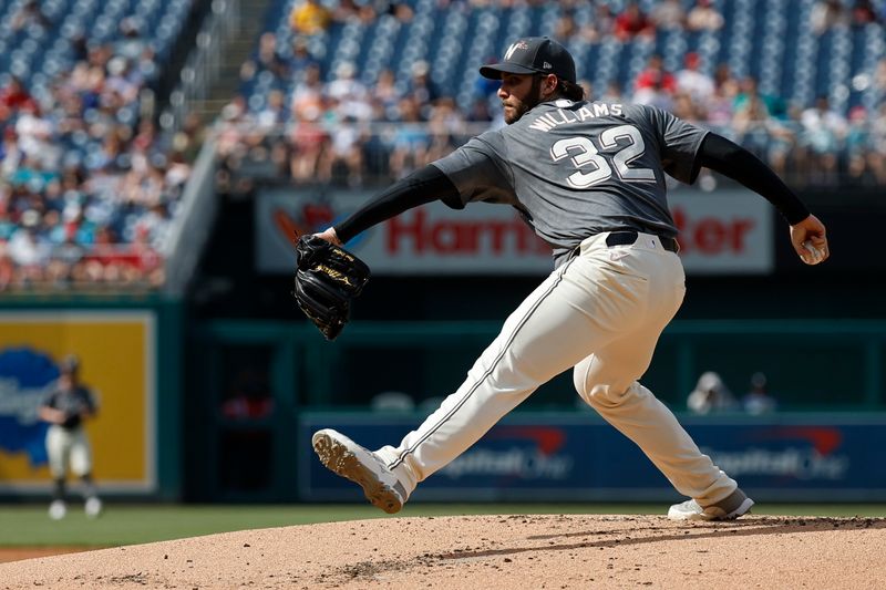 May 25, 2024; Washington, District of Columbia, USA; Washington Nationals starting pitcher Trevor Williams (32) pitches against the Seattle Mariners during the second inning at Nationals Park. Mandatory Credit: Geoff Burke-USA TODAY Sports