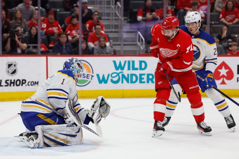 Apr 7, 2024; Detroit, Michigan, USA; Buffalo Sabres goaltender Ukko-Pekka Luukkonen (1) makes a save in front of Detroit Red Wings center Dylan Larkin (71) in the second period at Little Caesars Arena. Mandatory Credit: Rick Osentoski-USA TODAY Sports