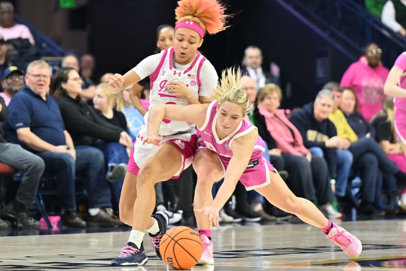 Feb 4, 2024; South Bend, Indiana, USA; Notre Dame Fighting Irish guard Hannah Hidalgo (3) and Pittsburgh Panthers guard Marley Washenitz (11) reach for a loose ball in the second half at the Purcell Pavilion. Mandatory Credit: Matt Cashore-USA TODAY Sports