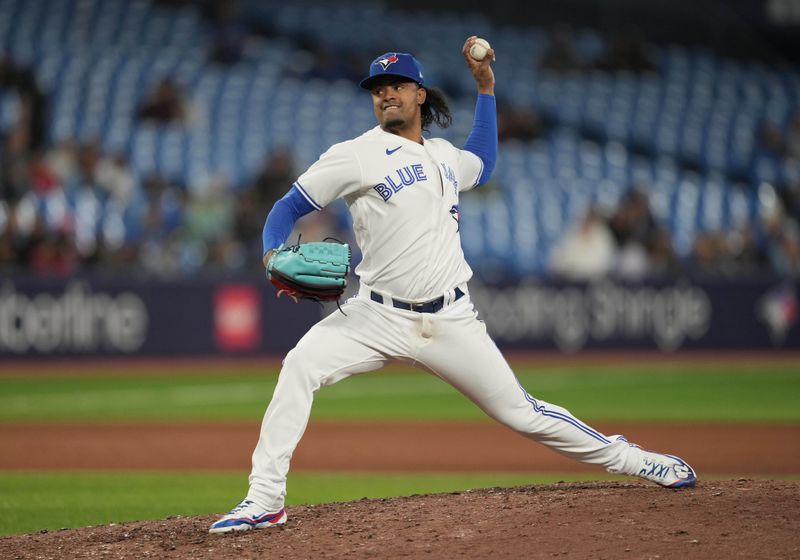 Sep 13, 2023; Toronto, Ontario, CAN; Toronto Blue Jays relief pitcher Genesis Cabrera (92) throws a pitch against the Texas Rangers during the eighth inning at Rogers Centre. Mandatory Credit: Nick Turchiaro-USA TODAY Sports