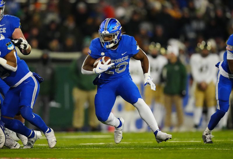 Nov 19, 2022; Colorado Springs, Colorado, USA; Air Force Falcons running back Brad Roberts (20) carries the ball in the first quarter at Falcon Stadium. Mandatory Credit: Ron Chenoy-USA TODAY Sports