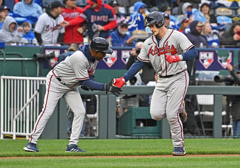 Apr 15, 2023; Kansas City, Missouri, USA;  Atlanta Braves catcher Sean Murphy (12) hits a solo home run during the fifth inning against the Kansas City Royals at Kauffman Stadium. Mandatory Credit: Peter Aiken-USA TODAY Sports