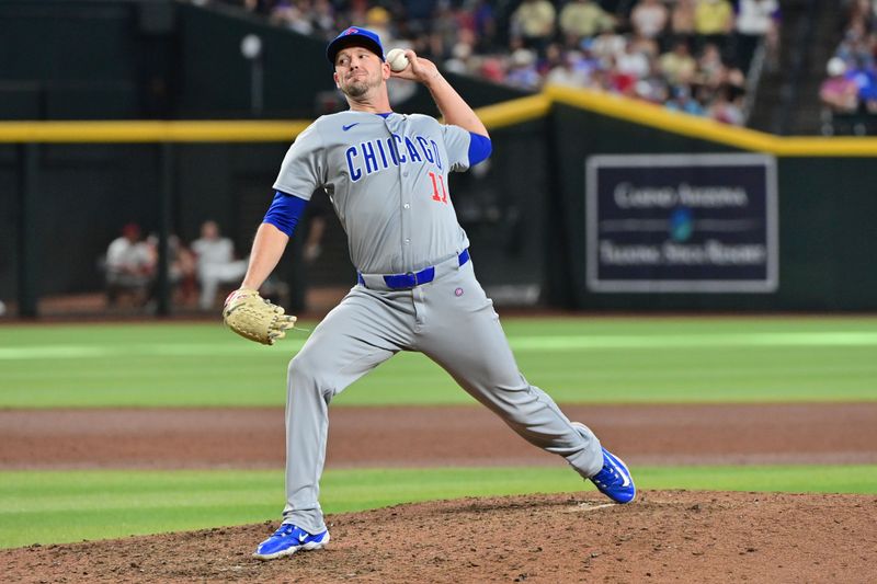 Apr 17, 2024; Phoenix, Arizona, USA; Chicago Cubs pitcher Drew Smyly (11) throws in the ninth inning against the Arizona Diamondbacks at Chase Field. Mandatory Credit: Matt Kartozian-USA TODAY Sports