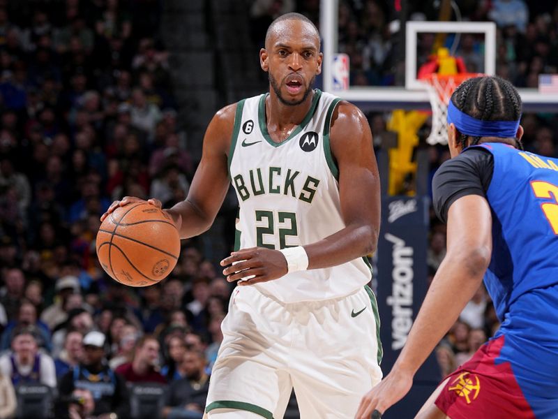 DENVER, CO - MARCH 25: Khris Middleton #22 of the Milwaukee Bucks dribbles the ball during the game against the Denver Nuggets on March 25, 2023 at the Ball Arena in Denver, Colorado. NOTE TO USER: User expressly acknowledges and agrees that, by downloading and/or using this Photograph, user is consenting to the terms and conditions of the Getty Images License Agreement. Mandatory Copyright Notice: Copyright 2023 NBAE (Photo by Bart Young/NBAE via Getty Images)