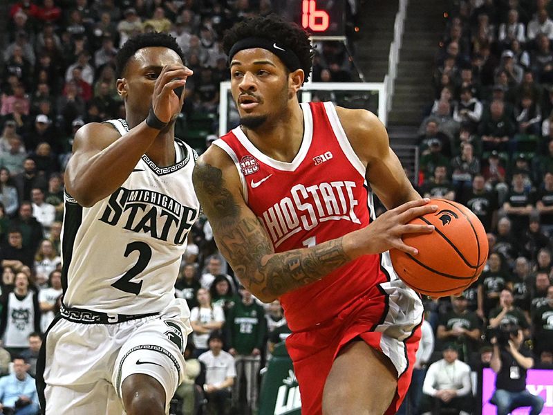 Feb 25, 2024; East Lansing, Michigan, USA;  Ohio State Buckeyes guard Roddy Gayle Jr. (1) drives against Michigan State Spartans guard Tyson Walker (2) during the first half at Jack Breslin Student Events Center. Mandatory Credit: Dale Young-USA TODAY Sports