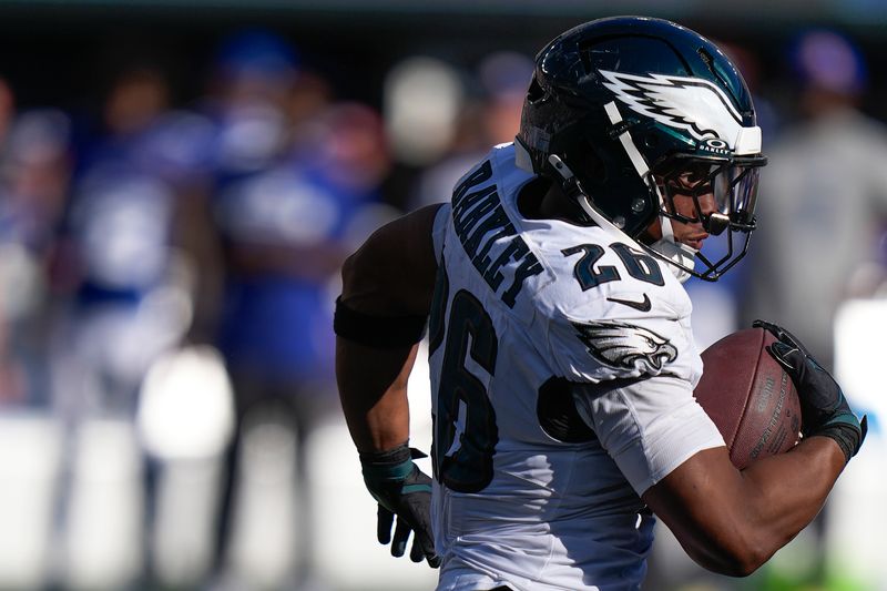 Philadelphia Eagles running back Saquon Barkley (26) carries the ball against the New York Giants during the second half of an NFL football game, Sunday, Oct. 20, 2024, in East Rutherford, N.J. (AP Photo/Frank Franklin II)