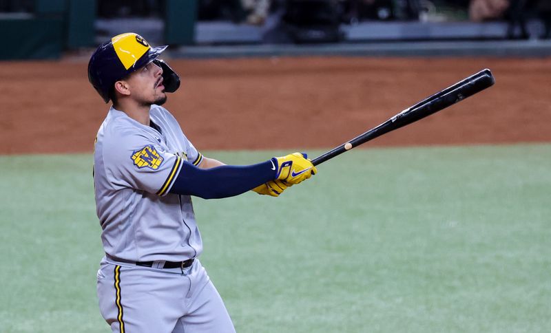 Aug 19, 2023; Arlington, Texas, USA;  Milwaukee Brewers shortstop Willy Adames (27) hits a home run during the sixth inning against the Texas Rangers at Globe Life Field. Mandatory Credit: Kevin Jairaj-USA TODAY Sports
