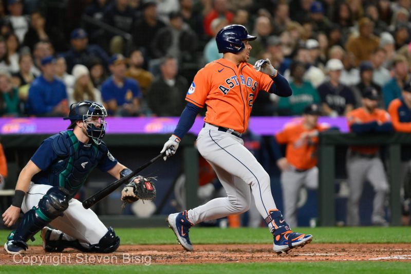 Sep 27, 2023; Seattle, Washington, USA; Houston Astros left fielder Michael Brantley (23) hits a single against the Seattle Mariners during the fourth inning at T-Mobile Park. Mandatory Credit: Steven Bisig-USA TODAY Sports