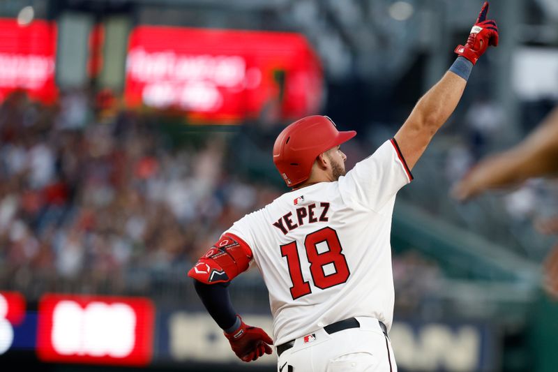 Jul 19, 2024; Washington, District of Columbia, USA; Washington Nationals first base Juan Yepez (18) celebrates while rounding the bases after hitting a three run home run against the Cincinnati Reds during the fifth inning at Nationals Park. Mandatory Credit: Geoff Burke-USA TODAY Sports