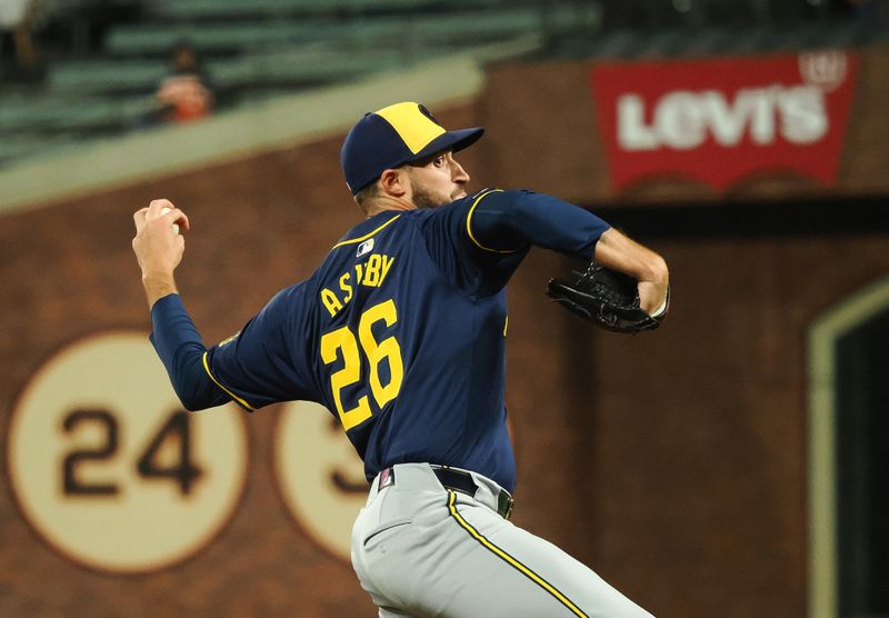 Sep 12, 2024; San Francisco, California, USA; Milwaukee Brewers relief pitcher Aaron Ashby (26) pitches the ball against the San Francisco Giants during the seventh inning at Oracle Park. Mandatory Credit: Kelley L Cox-Imagn Images