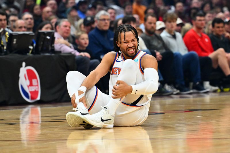 CLEVELAND, OHIO - MARCH 03: Jalen Brunson #11 of the New York Knicks reacts after an injury during the first quarter against the Cleveland Cavaliers at Rocket Mortgage Fieldhouse on March 03, 2024 in Cleveland, Ohio. NOTE TO USER: User expressly acknowledges and agrees that, by downloading and or using this photograph, User is consenting to the terms and conditions of the Getty Images License Agreement. (Photo by Jason Miller/Getty Images)