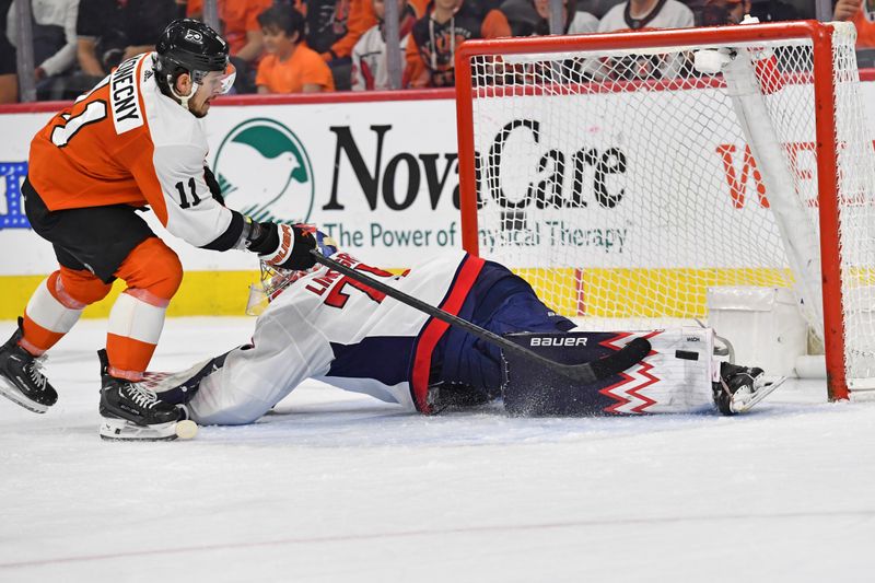 Apr 16, 2024; Philadelphia, Pennsylvania, USA; Washington Capitals goaltender Charlie Lindgren (79) makes a save against Philadelphia Flyers right wing Travis Konecny (11) during the second period at Wells Fargo Center. Mandatory Credit: Eric Hartline-USA TODAY Sports