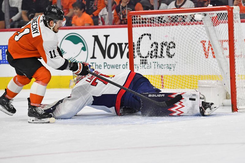 Apr 16, 2024; Philadelphia, Pennsylvania, USA; Washington Capitals goaltender Charlie Lindgren (79) makes a save against Philadelphia Flyers right wing Travis Konecny (11) during the second period at Wells Fargo Center. Mandatory Credit: Eric Hartline-USA TODAY Sports