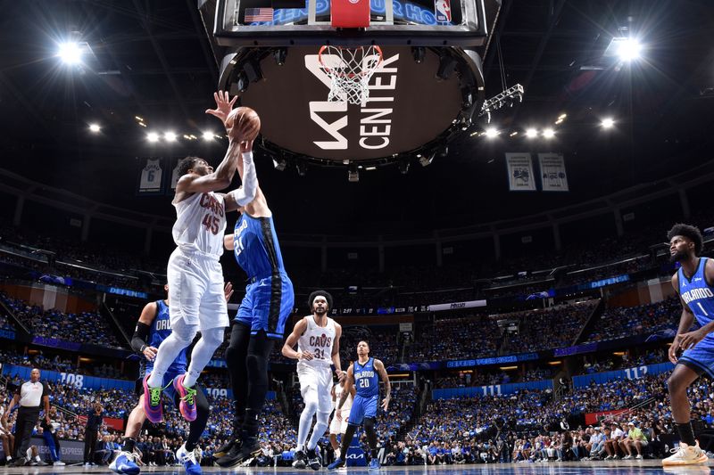 ORLANDO, FL - APRIL 27: Donovan Mitchell #45 of the Cleveland Cavaliers drives to the basket during the game against the Orlando Magic during Round 1 Game 4 of the 2024 NBA Playoffs on April 27, 2024 at the Kia Center in Orlando, Florida. NOTE TO USER: User expressly acknowledges and agrees that, by downloading and or using this photograph, User is consenting to the terms and conditions of the Getty Images License Agreement. Mandatory Copyright Notice: Copyright 2024 NBAE (Photo by Fernando Medina/NBAE via Getty Images)