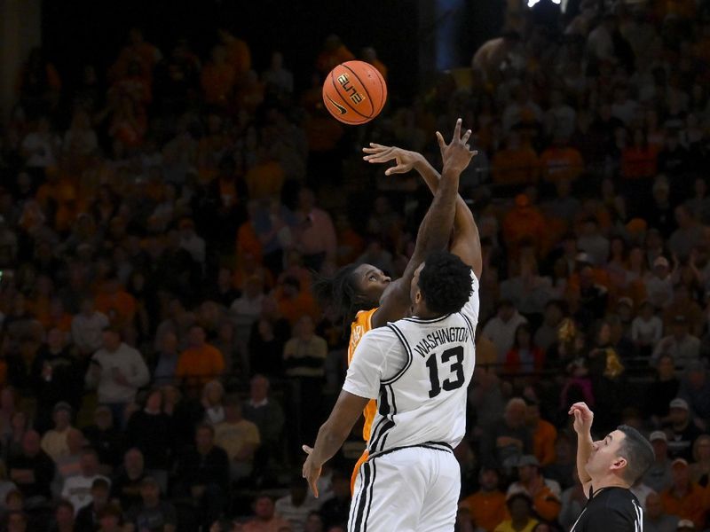 Feb 21, 2026; Nashville, Tennessee, USA;  Vanderbilt Commodores forward Jalen Washington (13) wins the tip against the Tennessee Volunteers during the first half at Memorial Gymnasium. Mandatory Credit: Steve Roberts-Imagn Images