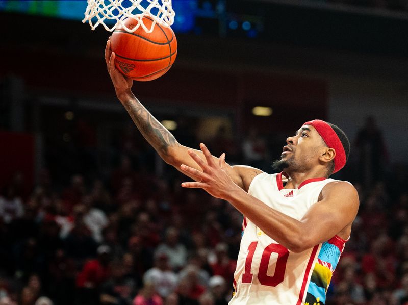 Feb 17, 2024; Lincoln, Nebraska, USA; Nebraska Cornhuskers guard Jamarques Lawrence (10) shoots the ball against the Penn State Nittany Lions during the first half at Pinnacle Bank Arena. Mandatory Credit: Dylan Widger-USA TODAY Sports