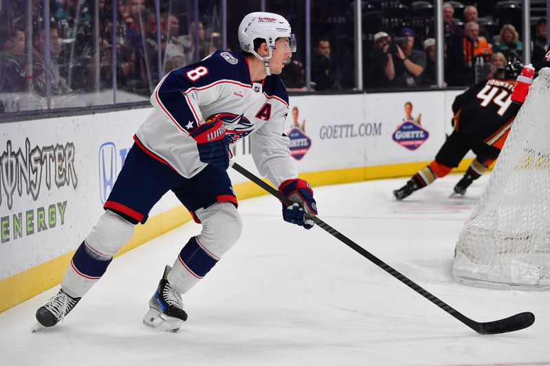 Feb 21, 2024; Anaheim, California, USA; Columbus Blue Jackets defenseman Zach Werenski (8) controls the puck against the Anaheim Ducks during the first period at Honda Center. Mandatory Credit: Gary A. Vasquez-USA TODAY Sports