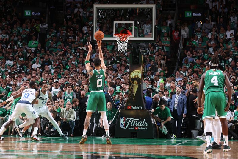 BOSTON, MA - JUNE 17: Jayson Tatum #0 of the Boston Celtics shoots a free throw during the game against the Dallas Mavericks during Game 5 of the 2024 NBA Finals on June 17, 2024 at the TD Garden in Boston, Massachusetts. NOTE TO USER: User expressly acknowledges and agrees that, by downloading and or using this photograph, User is consenting to the terms and conditions of the Getty Images License Agreement. Mandatory Copyright Notice: Copyright 2024 NBAE  (Photo by Nathaniel S. Butler/NBAE via Getty Images)