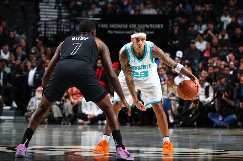 BROOKLYN, NY - NOVEMBER 19: Tre Mann #23 of the Charlotte Hornets handles the ball during the game against the Brooklyn Nets during an Emirates NBA Cup game on November 19, 2024 at Barclays Center in Brooklyn, New York. NOTE TO USER: User expressly acknowledges and agrees that, by downloading and or using this Photograph, user is consenting to the terms and conditions of the Getty Images License Agreement. Mandatory Copyright Notice: Copyright 2024 NBAE (Photo by David L. Nemec/NBAE via Getty Images)