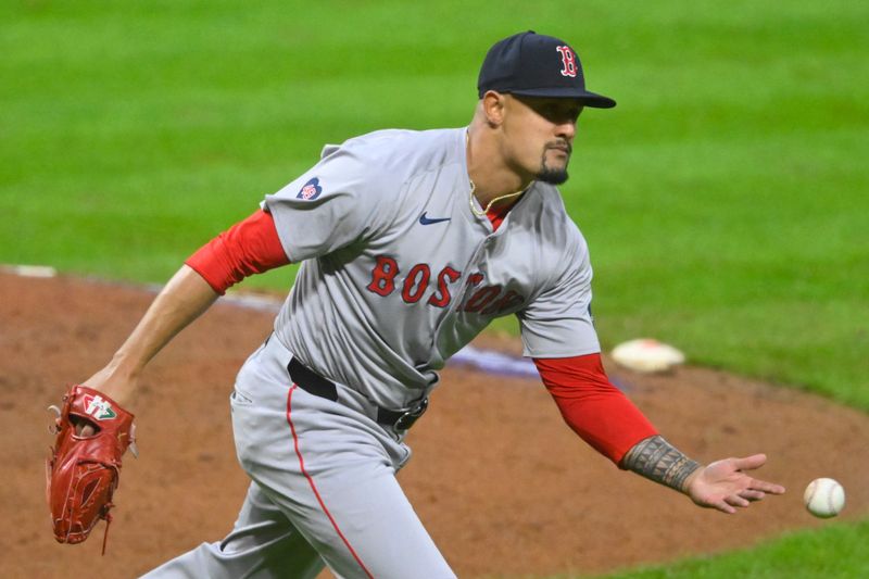 Apr 23, 2024; Cleveland, Ohio, USA; Boston Red Sox relief pitcher Brennan Bernardino (83) throws the ball to first base in the seventh inning against the Cleveland Guardians at Progressive Field. Mandatory Credit: David Richard-USA TODAY Sports