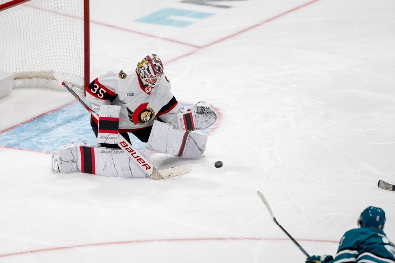 Nov 27, 2024; San Jose, California, USA; Ottawa Senators goaltender Linus Ullmark (35) makes a save against the San Jose Sharks during the second period at SAP Center at San Jose. Mandatory Credit: Neville E. Guard-Imagn Images