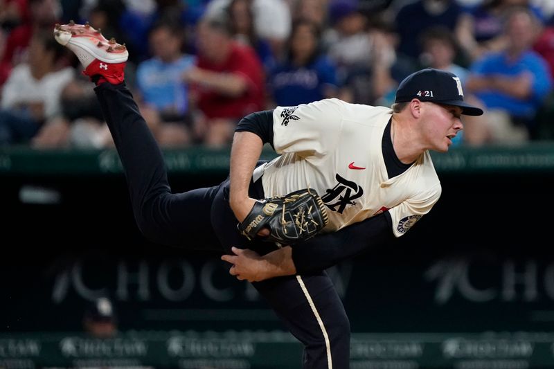 Sep 6, 2024; Arlington, Texas, USA; Texas Rangers pitcher Walter Pennington (52) follows through on a pitch during the fourth inning against the Los Angeles Angels at Globe Life Field. Mandatory Credit: Raymond Carlin III-Imagn Images