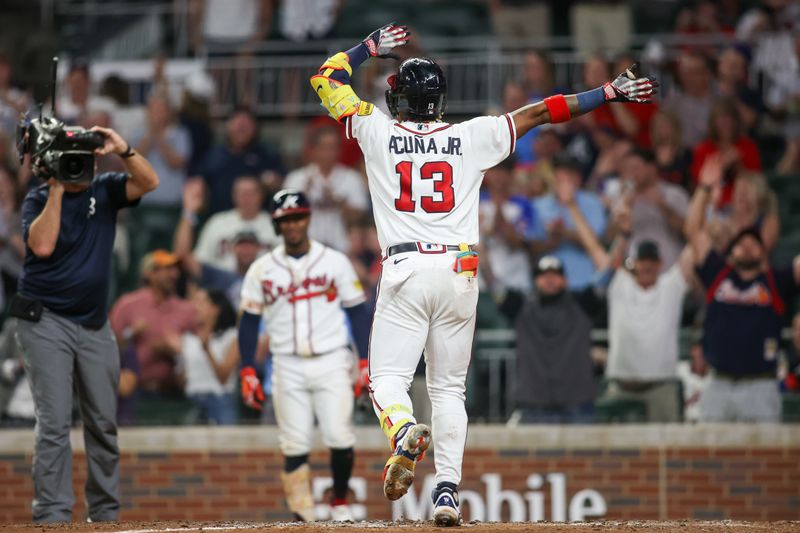 Sep 19, 2023; Atlanta, Georgia, USA; Atlanta Braves right fielder Ronald Acuna Jr. (13) celebrates after a home run against the Philadelphia Phillies in the sixth inning at Truist Park. Mandatory Credit: Brett Davis-USA TODAY Sports
