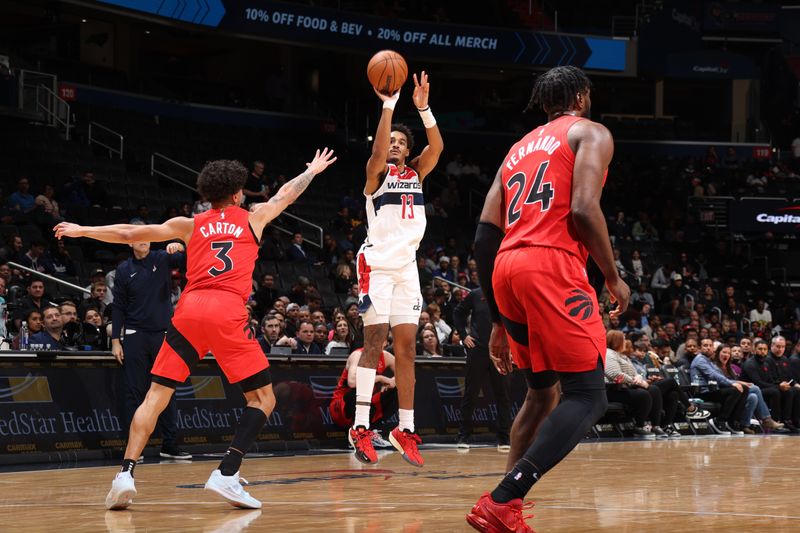 WASHINGTON, DC -? OCTOBER 11: Jordan Poole #13 of the Washington Wizards shoots a three point basket during the game against the Toronto Raptors during a NBA preseason game on October 11, 2024 at Capital One Arena in Washington, DC. NOTE TO USER: User expressly acknowledges and agrees that, by downloading and or using this Photograph, user is consenting to the terms and conditions of the Getty Images License Agreement. Mandatory Copyright Notice: Copyright 2024 NBAE (Photo by Stephen Gosling/NBAE via Getty Images)