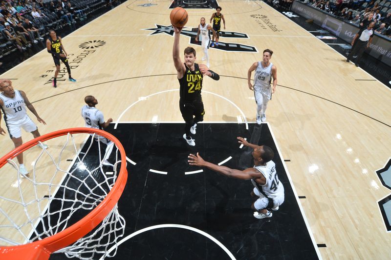 SAN ANTONIO, TX - OCTOBER 12: Walker Kessler #24 of the Utah Jazz shoots the ball during the game against the San Antonio Spurs during a NBA pre season game on October 12, 2024 at the Frost Bank Center in San Antonio, Texas. NOTE TO USER: User expressly acknowledges and agrees that, by downloading and or using this photograph, user is consenting to the terms and conditions of the Getty Images License Agreement. Mandatory Copyright Notice: Copyright 2024 NBAE (Photos by Michael Gonzales/NBAE via Getty Images)