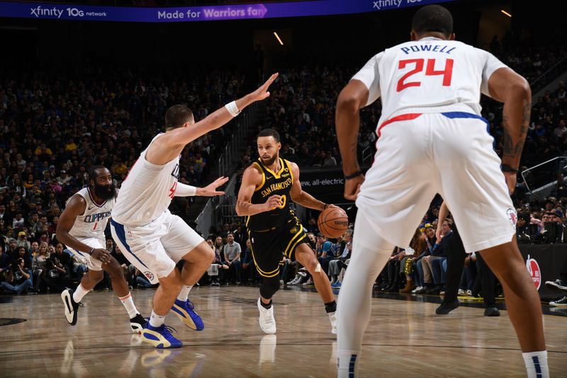 SAN FRANCISCO, CA - FEBRUARY 14: Stephen Curry #30 of the Golden State Warriors dribbles the ball during the game against the LA Clippers on FEBRUARY 14, 2024 at Chase Center in San Francisco, California. NOTE TO USER: User expressly acknowledges and agrees that, by downloading and or using this photograph, user is consenting to the terms and conditions of Getty Images License Agreement. Mandatory Copyright Notice: Copyright 2024 NBAE (Photo by Noah Graham/NBAE via Getty Images)